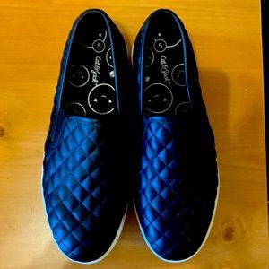 Girls size 5 quilted look black slip ons.Worn once!